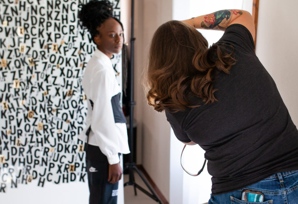 Springfield MO photographer Dynae Levingston working with a model.